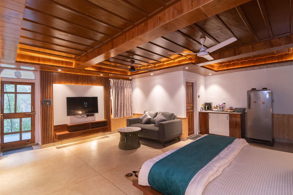 Suite sitting room with TV and kitchenette